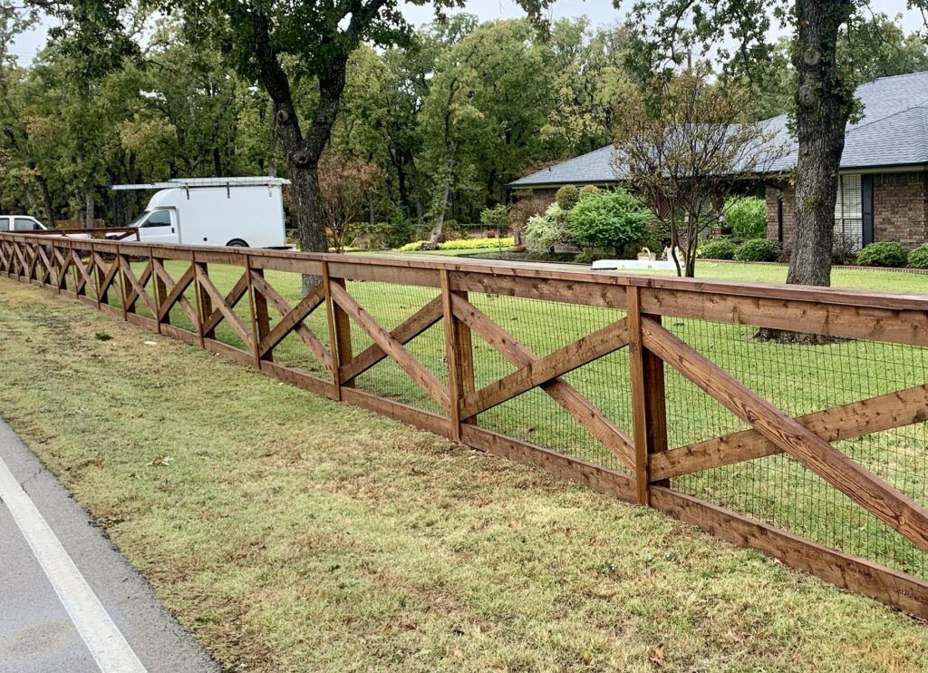 No-climb wire fence paired with split rail fencing, rural Baton Rouge, LA