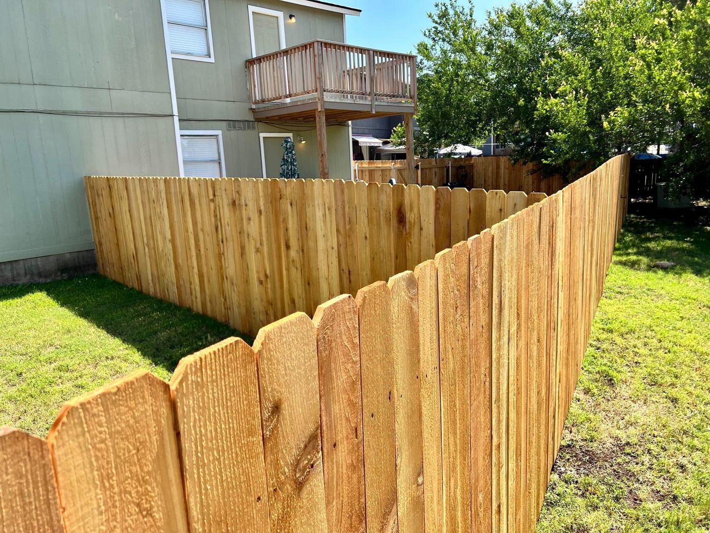 Completed wood dog-ear privacy fence installation in Baton Rouge, LA