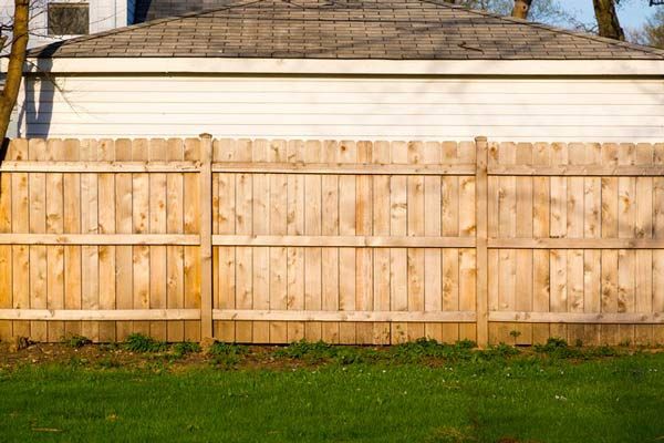 Wood privacy fence installed in a backyard in Baton Rouge, LA